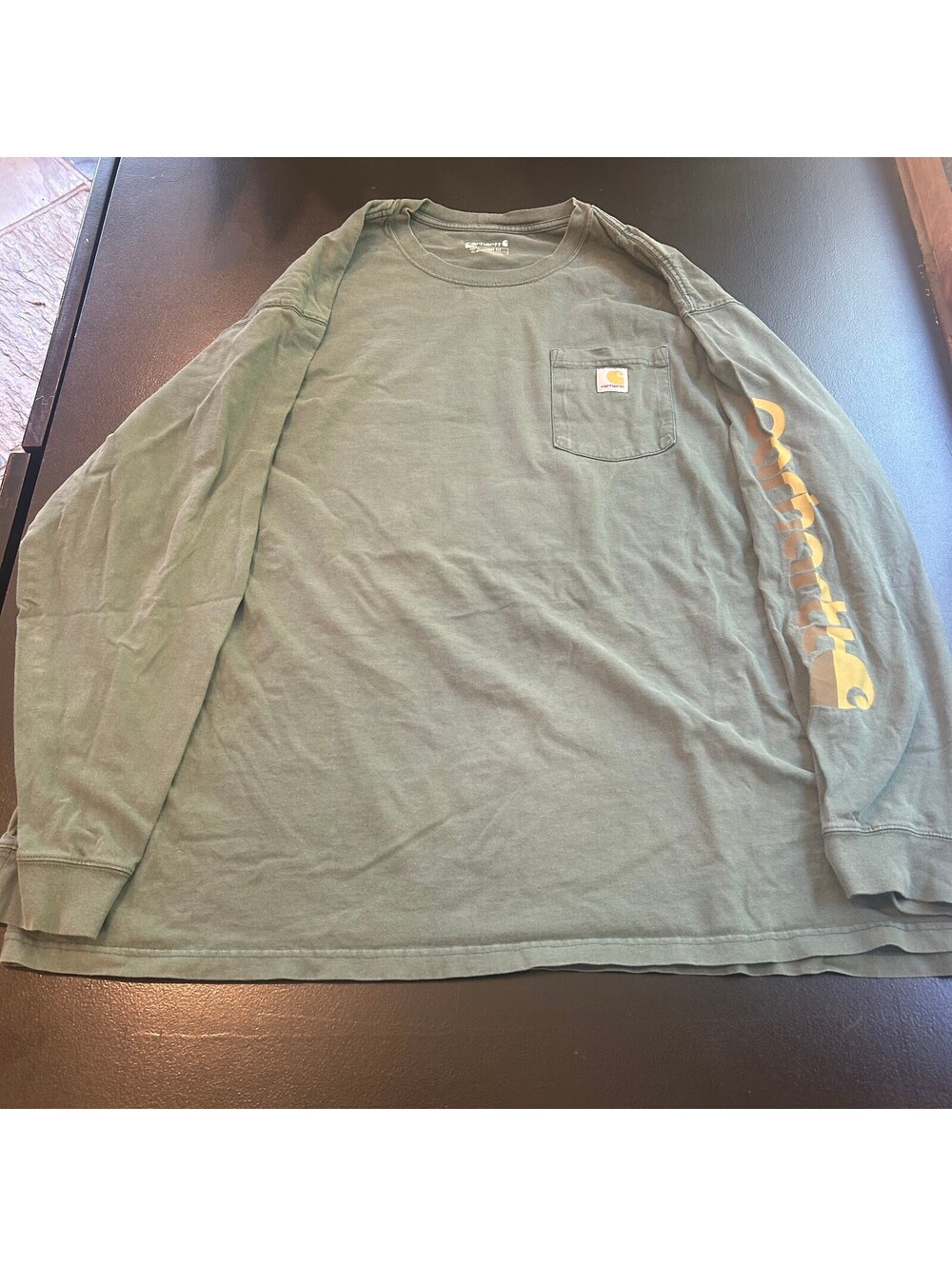 Vintage workwear Carhartt Men's Loose Fit 3XL Long Sleeve Pocket T-Shirt in Oli